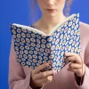 Runa-muistikirja kangaspäällystettyä paperia